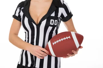 Foto op Canvas Female Referee Holding American Football © Andrey Popov