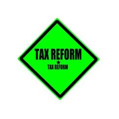 Tax reform black stamp text on green background