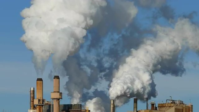 Factory Smoke Stacks Launch Smoke/Steam Emissions Into Sky
