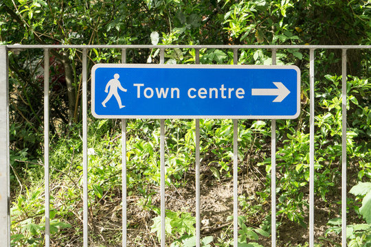 Sign for Town centre on metal railing