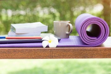 yoga mat and a cup of coffee