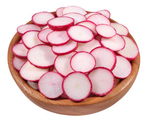 Red sliced radish in a wooden bowl on a white