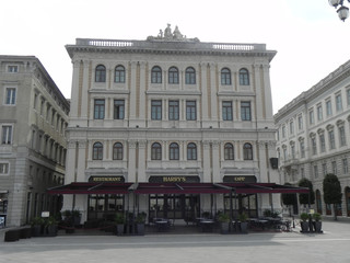 Fototapeta na wymiar The ancient Vanoli building in Piazza Unita, Trieste