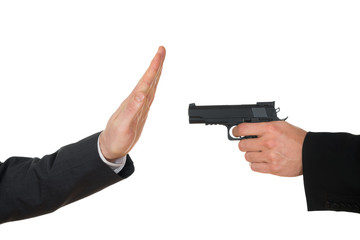 Businessman Aiming With Gun To Another Businessperson