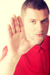 Fototapeta premium Man pressing an abstract touchscreen button