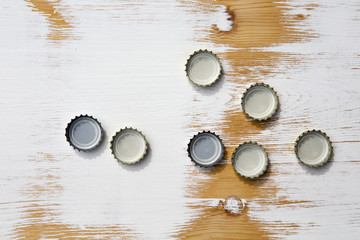 bottle cap on rustic wooden background