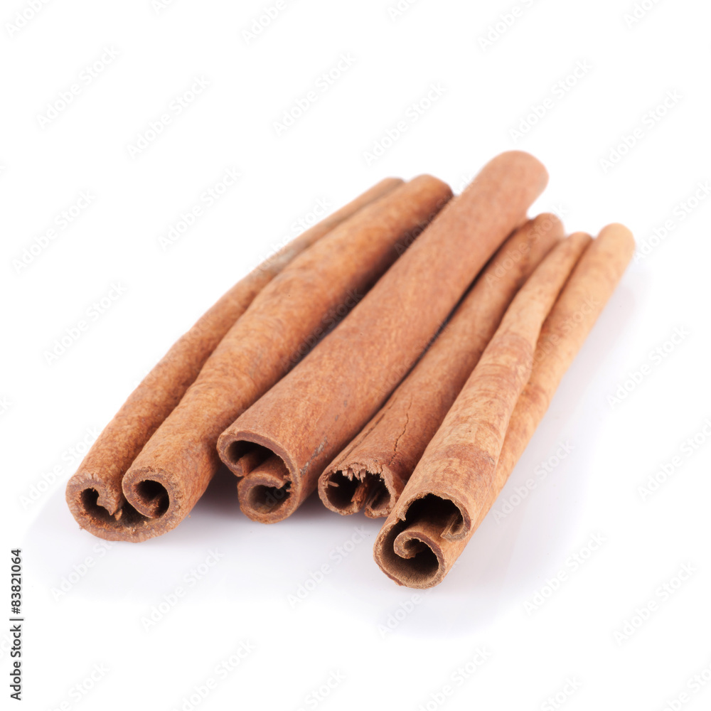 Wall mural cinnamon isolated on white background