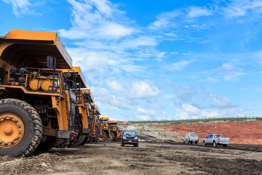 big truck in open pit and blue sky
