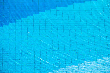 Blue ripped water in swimming pool