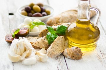 Bread and olive oil with snacks