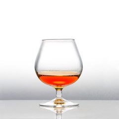 A with cognac filled snifter