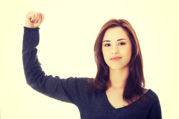 Young woman showing her strength