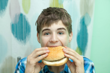 Teenager with burger