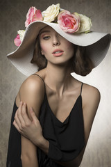 stunning girl with flowers on hat