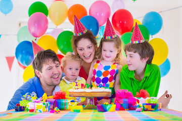 Family celebrating birthday party