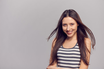 Happy woman with flying hair