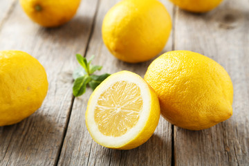 Lemons on grey wooden background