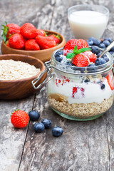 fresh yogurt with oat flakes and berries