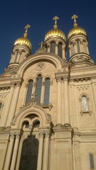 Fototapeta na wymiar building an Orthodox church with golden domes