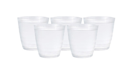 pouring water on a glass on white background