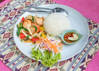 Stir-fried shrimp with holy basil and rice set serve with fish s