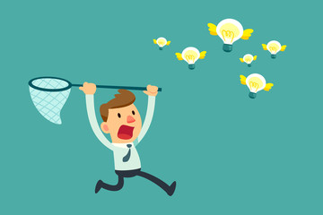 businessman try to catch flying idea bulbs