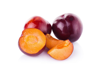 plums isolated on white