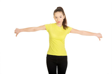 Unhappy woman with thumbs down.