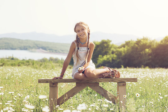 Little girl in flower field