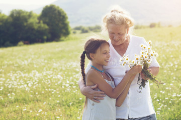 Great-grandmother and granddaughter