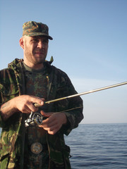 fisherman with rod in your hand