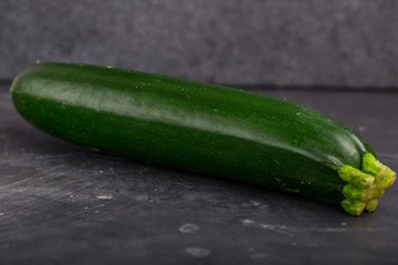 Zucchini on a black background
