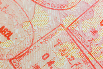 Different border stamps in a passport page - travel