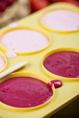 making homemade summer fruit lolly pops