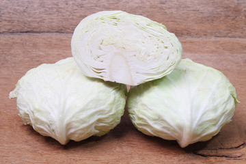 close up shot of a white collard on wood background.