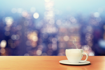 cup of coffee on a wooden table in a cafe