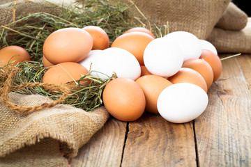 Eggs on wooden background