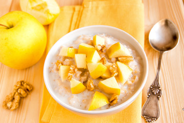 oatmeal porridge with apples, nuts