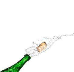 bottle of champagne popping its cork and splashing