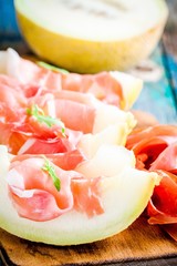 melon with thin slices of prosciutto