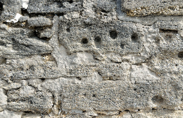Stone wall at historic Castle of San Marcos