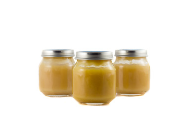 Three jars with fruit puree each other