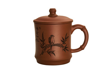 Chinese clay cup isolated on white background.