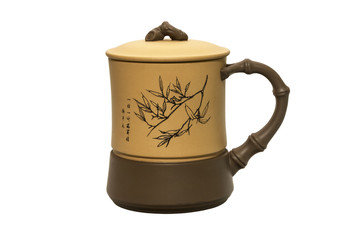 Chinese clay cup isolated on white background.