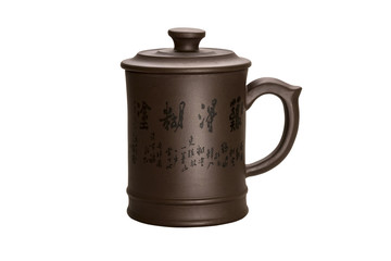 Chinese clay cup isolated on white background.