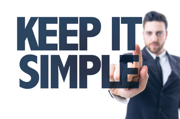 Business man pointing the text: Keep it Simple