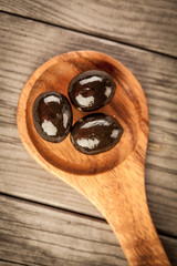 Olives on a wooden table