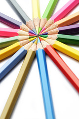 Naklejka premium Colorful wooden pencils art composition on white background