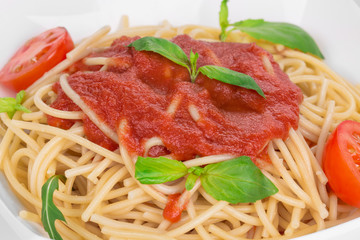 Spaghetti with tomato and basil.