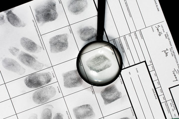 Fingerprint on police fingerprint card.
